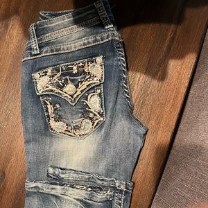 Grace capris with pretty pink design and rhinestones.  Size 25